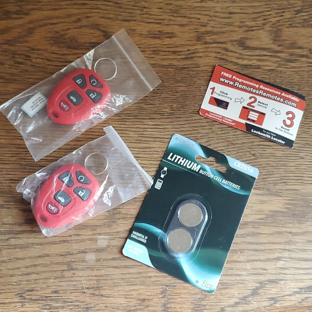GM 2 OEM Remotes FC 5 Buttons FCC ID 2AOVX-03. Model 2AOVX5B